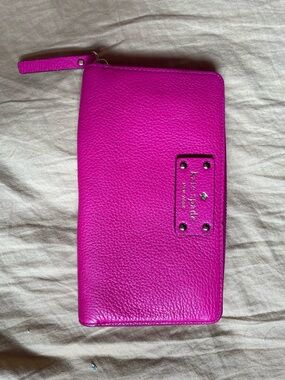 kate spade Vibrant Fuchsia Pebbled Leather Wallet with Gold Logo